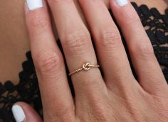 Reveal your inner bohemian goddess with this stunning stacking knot ring ▲ Available in 14k gold fill and sterling silver ▲ Please choose you color at checkout ▲ Available in sizes 1-9 ▲ You will receive one knot ring Whether worn alone or stacked with my other beauties you will be sure to turn heads! Please copy and paste this link for an international ring size conversion chart-http://www.tradeshop.com/master/sizetablebb.html Thank you for looking, please stop by and take a look at my shop! ht Bohemian Gold Stackable Rings In Sterling Silver, Bohemian Gold Stackable Sterling Silver Rings, Elegant Handmade Promise Midi Rings, Elegant Handmade Midi Rings For Promise, Dainty Infinity Stackable Promise Rings, Christians Quotes, Bf Gifts, Relationship Gifts, Infinity Ring