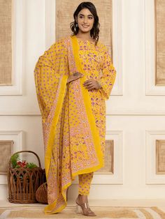 This 3-piece set includes yellow cotton ethnic motif print straight shape pakistani style kurta has round neck, full sleeves, straight hem, calf length teamed with printed trouser pants has elasticated waistband & slip on closure and a printed voile dupatta. Washing instructions state to hand wash. The model wearing the size small is 5'8 in height. 3 Piece Set Color-Yellow Suit Fabric- Cotton Dupatta Fabric-Voile Work - Ethnic Motif Print detailing Neck - Round Neck Sleeves - Full Sleeves Length Yellow Anarkali Set With Straight Kurta And Printed Motifs, Yellow Anarkali Set With Printed Motifs, Anarkali Sets With Printed Motifs In Yellow, Traditional Printed Sets With Straight Kurta, Yellow Salwar Kameez With Printed Motifs For Navratri, Semi-stitched Block Print Long Sleeve Sets, Yellow Navratri Salwar Kameez With Printed Motifs, Navratri Yellow Salwar Kameez With Printed Motifs, Cotton Long Sleeve Churidar With Block Print