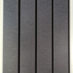 the back side of a black door with bars on it