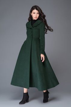 This coat is a stunning color, lovely length, and keeps warm. About the coat: The long wool coat is made of 50% wool blend. The warm coat has a fully satin lined, The wool coat is closed by front buttons, you can tie the belt if you like. From the  Forest Green Wool coat, it has three buttons above Chic Green Wool Coat For Winter, Green Long Wool Coat For Winter, Green Long Wool Winter Coat, Green Wool Coat For Winter, Chic Long Green Wool Coat, Chic Green Long Wool Coat, Green Single-breasted Wool Coat For Winter, Chic Green Pea Coat For Winter, Fitted Green Wool Coat For Winter