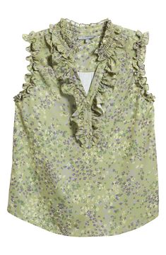 A breezy fabric shapes this lightweight top designed with a frilled neckline and a button half placket. 25" length Button half placket Split neck Sleeveless 100% polyester Machine wash, tumble dry Imported Green Ruffled Tank Top For Spring, Green Sleeveless Tank Top With Ruffles, Sleeveless Ruffle Blouse For Spring, Sleeveless Ruffled Blouse For Daywear, Sleeveless Ruffle Blouse For Daywear, Chic Ruffled Tank Top For Daywear, Green Sleeveless Top With Ruffles, Green Ruffled Sleeveless Blouse, Green Sleeveless Ruffle Blouse