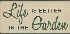 a sign that says life is better in the garden on white with green trimming