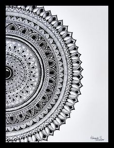 a black and white drawing of a circular object with intricate designs on the center piece