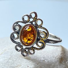 "* Materials: Baltic Amber, 925 Sterling Silver * Stone color: Honey * Stone size: 0.31\"X 0.19\"(8 mmx5mm) * Weight: 2.5 gram * This ring is for adults only. Natural Baltic Vintage Amber Ring . Did you know that Amber was one of the first materials ever used for accessorizing? Ornaments made out of amber were found on prehistoric people dating all the way back to the Stone Age, which was over 10,000 years ago! Throughout centuries it has been known for its healing properties and widely used all Prehistoric People, Amber Ring, Stone Age, Natural Amber, Amber Stone, Amber Jewelry, Nature Jewelry, Baltic Amber, Healing Properties