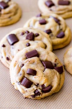 chocolate chip cookies on a baking sheet ready to be baked in the oven for consumption