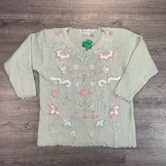 Nwt Deadstock Nos Vintage 90s Shenanigans Pastel Light Green With Pink & White Floral Embroidery & Beading Cottagecore Grannycore V-Neck Pullover Sweater With Shoulder Pads Size Medium - Brand New With Tags, Deadstock, New Old Stock - Never Worn Or Washed - Mid-Weight & Cozy, Made In China, 55% Ramie/45% Cotton Construction - Pleasant & Feminine, Light Pastel Green With Pink & White Floral Embroidery & Beading, Plus Shoulder Pads - Super Retro 90s, Department Store Grandma, Spring Cottagecore, E 90s Style Long Sleeve Spring Sweater, 90s V-neck Tops For Fall, Cottagecore Easter, Spring Cottagecore, Light Pastel Green, Monogram Sweater, Diamond Sweaters, Easter Vibes, Blue Cashmere Sweater