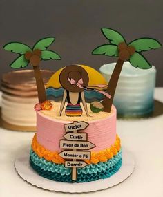 there is a cake that has been decorated with palm trees and signs on the top