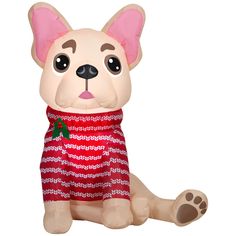 a stuffed dog wearing a red and white sweater