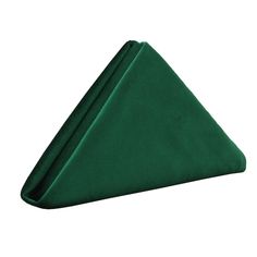 a green napkin folded in the shape of a triangle