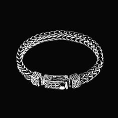 From the timeless art of handcrafting, where tradition meets modern elegance, comes a bracelet that embodies both strength and sophistication. Our Handwoven Rope Twist Bracelet features an intricate rope twist pattern, symbolizing unity and resilience. Crafted from high-quality materials, this bracelet combines durability with a refined aesthetic. Perfect for those who appreciate unique and stylish accessories, this bracelet adds a touch of classic charm to any outfit. Made from high-quality mat Classic Adjustable Bracelet With Intricate Design, Classic Adjustable Sterling Silver Bracelet With Intricate Design, Elegant Engraved Braided Bangle Bracelet, Adjustable Metal Bracelets With Intricate Design, Classic Metal Bracelets With Intricate Design, Classic Metal Bracelet With Intricate Design, Adjustable Spiritual Bracelets With Intricate Design, Adjustable Spiritual Bracelet With Intricate Design, Braided Metal Bracelets As Gift