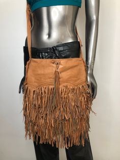 Orange real leather shoulder bag on zipper with fringe and pockets. Good condition. Vintage Leather Bags With Fringe, Fringe Satchel Shoulder Bag For Fall, Leather Shoulder Bag With Tassels For Fall, Fall Leather Shoulder Bag With Fringe, Fall Leather Fringe Shoulder Bag, Fall Fringe Leather Shoulder Bag, Leather Shoulder Bag With Tassels For Travel, Leather Travel Shoulder Bag With Tassels, Fall Leather Fringe Bags