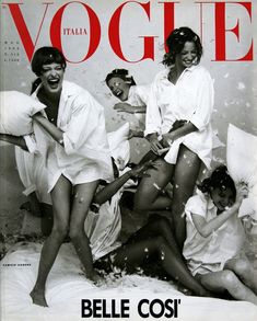 an italian magazine cover with three women in white robes on the bed and one woman laying down