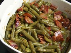 green beans with bacon in a white dish