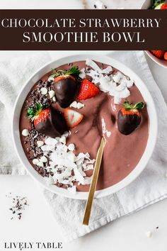 chocolate strawberry smoothie bowl with strawberries on top