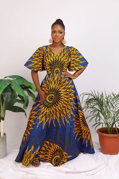 This exquisite outfit is an ideal choice for any occasion, be it a date, hangouts, work, church, dinner, movie night, birthday, wedding or any party. Its versatility ensures it's the perfect fit for every occasion. Features: - Crafted by hand from 100% African wax cotton As always, our designs are completely handmade and can be customized to your liking, this means you're welcome to request alterations, whether it's custom lengths for petite or tall individuals, design element additions or removals, or a different fabric selection. Just get in touch with us and we will be happy to take any special request. For the best fit, you can provide your measurements or select your size from our accurate size chart. Don't forget to include your height when ordering to ensure the perfect length. Care African Print Maxi Dress, African Gowns, Ankara Maxi Dress, Dress African Print, Ankara Long Gown Styles, Dress Ankara, African Designs, African Print Dress Ankara, African Print Clothing