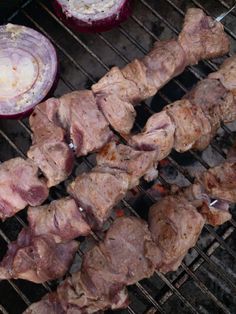 the meat is being cooked on the grill and ready to be grilled for consumption