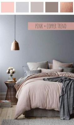 a bedroom with pink and copper colors on the walls, bed linens in different shades