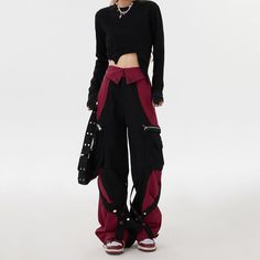 Our Grunge Aesthetic Cargo Pants feature a wide-leg fit, red and black two-tone design with multiple pockets and buckle straps Size: • S: Waist: 64cm/ 25.2 in, Hips: 100cm/ 39.4 in, Length: 100cm/ 39.4 in• M: Waist: 68cm/ 26.8 in, Hips: 104cm/ 40.9 in, Length: 102cm/ 40.2 in• L: Waist: 72cm/ 28.3 in, Hips: 108cm/ 42.5 in, Length: 104cm/ 40.9 in• XL: Waist: 76cm/ 29.9 in, Hips: 112cm/ 44.1 in, Length: 106cm/ 41.7 inMaterial: Polyester Red Punk Bottoms With Belt Loops, Edgy Red Pants For Streetwear, Edgy Red Bottoms For Alternative Fashion, Red High-waist Baggy Cargo Pants, Red High Waist Baggy Cargo Pants, Red High Waisted Baggy Cargo Pants, Red Baggy Parachute Pants For Streetwear, High Waist Baggy Red Cargo Pants, Red Baggy Full-length Cargo Pants