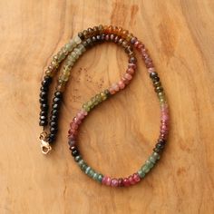 ¡Algunos días solo necesitas un poco de color! La turmalina es la solución perfecta para agregar un arcoíris de tonos tierra. Dos collares diferentes para tu elección:

 • Gargantilla sencilla de 15"

 • Gargantilla de 16" con colgante de flor plateada de Hill Tribe y detalles de cuentas plateadas Multicolor Tourmaline Gemstone Beads Necklaces, Multicolor Faceted Tourmaline Necklaces, Bohemian Multicolor Tourmaline Necklaces, Multicolor Round Necklaces For Everyday, Handmade Multicolor Tourmaline Necklaces, Pinterest Jewelry, Hill Tribe Silver, Gold Filled Earrings, Natural Earth