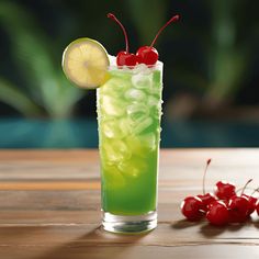 a tall glass filled with green liquid and cherries