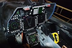 the cockpit of an airplane with multiple controls