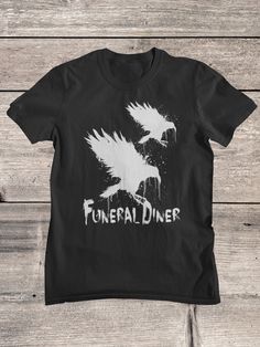 Funeral Diner T-Shirt. Funeral Diner was a screamo band from Half Moon Bay, California, located near San Francisco. Our Shirts, hoodies and tanks have been carefully chosen after many years of testing, they are semi fitted around the chest and arms, and therefore give a complimentary look, but they also come in a nice length, Our shirts can be washed many times and the print will not fade, so you can enjoy your product for many years to come.  Your Order will be shipped from the country closest Halloween Crew Neck Tops With Band Logo, Halloween Band Merch Tops With Band Logo, Halloween Band Merch Top With Band Logo, Band Merch Tops With Band Logo For Halloween, Band Logo Merch Tops For Halloween, Grunge Band Logo Tops For Halloween, Grunge Tops With Band Logo For Halloween, Halloween Band Logo T-shirt, Grunge Shirt With Band Logo For Fans