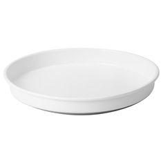 an empty white plate on a white background