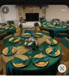 the table is set with green and gold linens