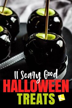 three black apples with green apples in them and the words it's scary good halloween treats