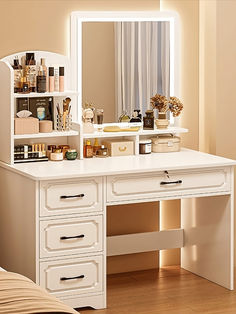 a white desk with drawers and a mirror