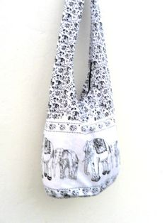 "This Beautiful convenient and very comfortable White Color Elephant Artistic Shoulder Bag. This bag its And can be a good idea for a gift or for personal use and its suitable for everyone. This White Color Elephant Artistic Shoulder Bag Comes with top zipper closure with Internal zipper pocket This bag is 100% cotton Measurements Size (Approx): Length: 17\" Height: 13\" Width: 7\" Strap Drop: 45\" Color: White Thank You For Watching" Bohemian Shoulder Bag With Mobile Phone Bag For Vacation, White Bohemian Hobo Bag For Travel, Bohemian White Hobo Bag For Travel, White Bohemian Hobo Tote Bag, White Bohemian Tote Bag, White Bohemian Bag With Adjustable Strap, Bohemian White Bag With Adjustable Strap, White Bohemian Beach Bag For Gift, White Bohemian Beach Bag As Gift