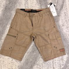 Nwt Projek Raw Cargo Shorts. Size 31 Excellent Condition One Zipper Pocket And One Flap Pocket. Brown Cargo Shorts With Cargo Pockets, Brown Cargo Shorts With Pockets, Lee Dungarees, Military Cargo Shorts, Military Khaki Shorts With Pockets, Mens Jean Shorts, Military Cargo Cotton Shorts, Hiking Shorts, Camo Shorts