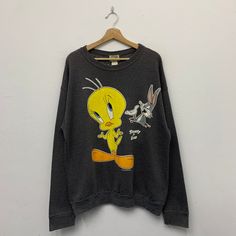 Looney Tunes Sweatshirt Vintage 1994 Warner Bros Looney Tunes Tweety & Bugs Bunny Cartoon Crewneck Sweatshirt Size Large - Etsy Malaysia Bugs Bunny Cartoon, Bugs Bunny Cartoons, Looney Tunes Tweety, Bunny Cartoon, Sweatshirt Vintage, Bugs Bunny, Looney Tunes, Baggy Jeans, Vintage Sweatshirt