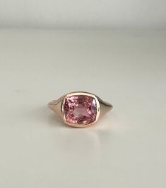 Introducing this bold 4.45ct tourmaline signet statement ring a symbol of empowerment and confidence.  Pink tourmaline is associated with emotional healing and promotes self-balance, attracts love and opens the heart chakra. It encourages self-acceptance, self-worth, and self-esteem, making it a beneficial stone for personal growth and empowerment.  This is one of a kind ring, available for immediate delivery in size 7 1/2US, can be resized, please advise on your size at checkout.  Metal:  Genui Luxurious Pink Gemstone Birthstone Ring, Tourmaline Ring Simple, Luxury Pink Tourmaline Gemstones, Luxury Gia Certified Tourmaline Rings, Ruby Tourmaline Ring, Luxury Pink Tourmaline Jewelry, Luxury Tourmaline Rings As A Gift, Pink Tourmaline Ring, Signet Rings