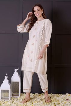 White chanderi kurta with floral and thread embroidery. Comes with pant. - Aza Fashions Festive Off White Straight Kurta Set, Festive Off White Sets With Straight Kurta, Festive Off-white Sets With Straight Kurta, Off-white Zari Work Straight Kurta Set, Mulmul Sets With Straight Kurta And Embroidered Border, Straight Kurta Sets In Mulmul With Embroidered Border, Mulmul Sets With Embroidered Border And Straight Kurta, Anarkali White Pant Set For Festive Occasions, Off White Chanderi Straight Kurta Set