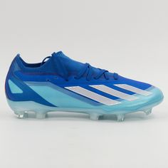 the adidas soccer shoe is blue and white