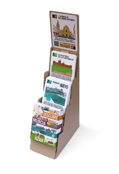 an open cardboard box with several different types of business cards in the bottom half and inside