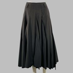 Prada Skirt In A Black Mohair Wool Blend Fabric Featuring A Pleated Style, Belt Loops, And Side Zipper And Snap Closure. Does Not Come With Belt. Made In Italy.Excellent Pre-Owned Condition. Marked: 38 Measurements: Waist: 26 Inches Length: 35.5 Inches Sui Generis Reference: 131816 Category: Skirt More Details Brand: Prada Gender: Female Size: 2 Color: Black Fabric: Mohair / Wool Pattern: Pleated Skirt Length: Long Age Group: Adult Sui Generis Designer Consignment Is An Award Winning Fashion Res Prada Skirt, Resale Store, Pleated Long Skirt, Mohair Wool, Black Fabric, Skirt Length, Long Skirt, Gq, Pleated Skirt