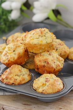 some muffins are sitting in a muffin tin