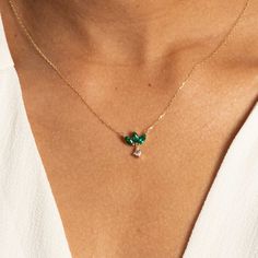 Elevate your elegance with an emerald marquise flower necklace featuring a princess-cut white sapphire dangle charm. Crafted from solid 10k gold, it showcases 0.81 carats of lab-created emeralds and 0.21 carats of lab-created white sapphires. Marquise Diamond Birthstone Jewelry, Elegant Dangle Emerald Necklace Gift, Elegant Green Charm Necklace For Anniversary, Marquise Emerald Jewelry In White Gold, Marquise Emerald White Gold Jewelry, Fine Jewelry May Birthstone Teardrop Pendant, Fine Jewelry Teardrop Pendant For May Birthstone, 14k Gold Marquise May Birthstone Jewelry, Elegant Marquise Emerald Jewelry