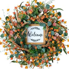 a welcome sign surrounded by flowers and greenery on a white background with the words welcome