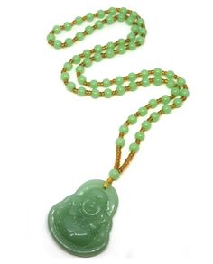 "Vintage Green Jade Bead Necklace 24\" Long With Jade Buddha Pendant 1.75\" Pre-owned. Good condition." Jade Beaded Single Strand Necklace Gift, Jade Single Strand Beaded Necklace Gift, Single Strand Jade Beaded Necklaces As Gift, Spiritual Single Strand Jade Beaded Necklace, Spiritual Single Strand Jade Necklace, Green Beaded Amulet Necklace, Jade Bead Necklaces For Meditation, Green Jade Necklace With 108 Beads, Green Hand-strung Long Necklace