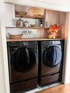 a washer and dryer in a small room