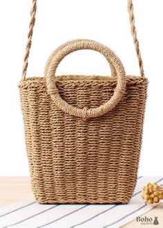 Braided straw bucket style bag This braided straw bucket bag is made from eco-friendly materials and is very trendy. With this compact cute bag, you can keep your essentials like your smartphone, wallet, and sunscreen close to hand. This bag can be worn over the shoulder or carried by hand, depending on your mood. It has round handles and a braided strap. The perfect finishing touch to your bohemian look! BAG DETAILS Bag type: bucket bag with shoulder strap Size: W 14 x H 20 x D 4 cm Material: s Bohemian Exterior, Woven Beach Bags, Woven Handbags, Handbag Pattern, Cute Bags, Woven Bag, Cute Bag, Haiti, Uganda