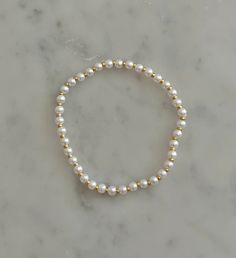 -faux pearls -stretchy bracelet Bracelet Business, Bow Bracelet, Beads Bracelet Design, Bracelet Design, Moon Jewelry, Stretchy Bracelets, Fancy Jewelry, Timeless Jewelry, Beads Bracelet