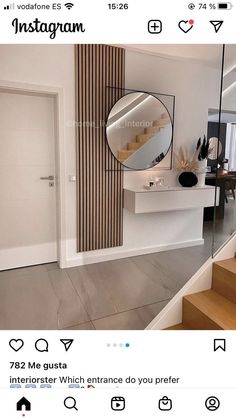 an instagram page with a mirror on the wall and stairs in front of it