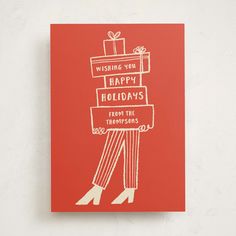 a red greeting card with an illustration of a woman holding a gift box and the words wishing you happy holidays from the viewpoints