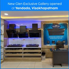 an advertisement for a new kitchen and appliance store with blue lights in the background