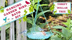 hanging garden bird bath diy sign with two birds on it's side and another sign in the background