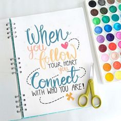 an open notebook with the words when you follow your heart you connect with who you are